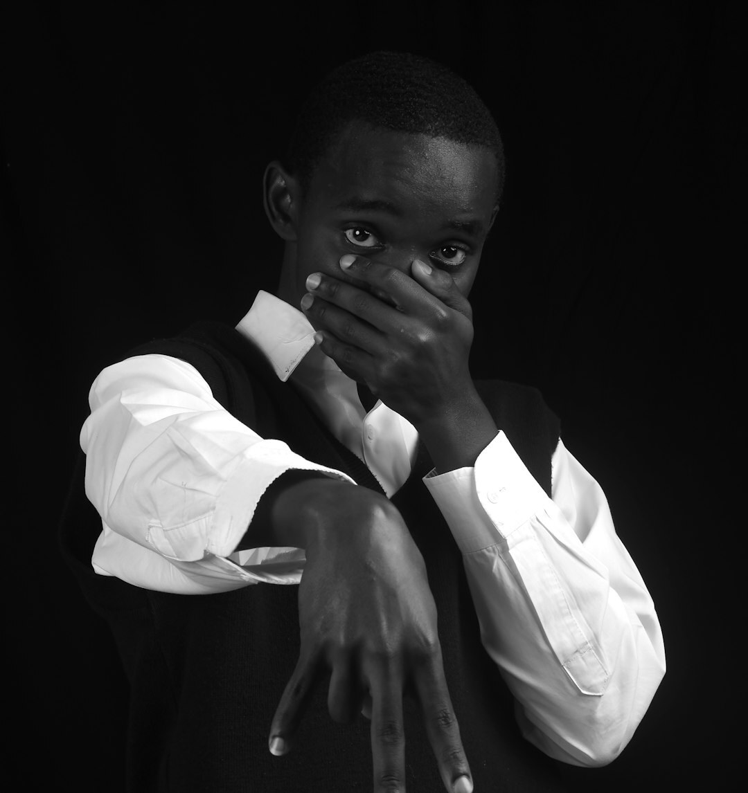 Studio portrait of a Black man in a suit