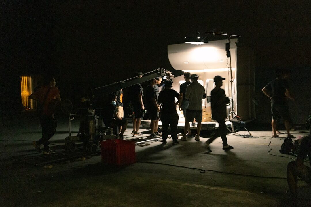 Production crew wearing headsets coordinating a shoot